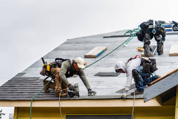 Professional Gutter Installation technician working in Morganville, NJ